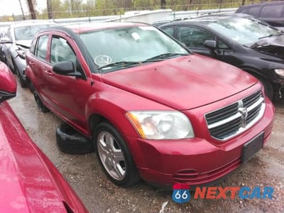 Czwarte zdjęcie samochodu z boku: 2009 DODGE CALIBER SXT VIN:1B3HB48AX9D125483 - miniatura