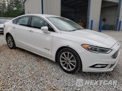 Czwarte zdjęcie samochodu z boku: 2017 FORD FUSION SE HYBRID VIN:3FA6P0LU9HR409720 - miniatura