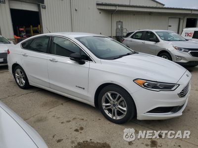 Czwarte zdjęcie samochodu z boku: 2018 FORD FUSION SE HYBRID VIN:3FA6P0LU7JR171954 - miniatura