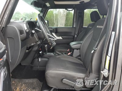 Zdjęcie 7 z 15 samochodu: 2017 JEEP WRANGLER UNLIMITED SAHARA VIN:1C4BJWEG2HL678001 - miniatura