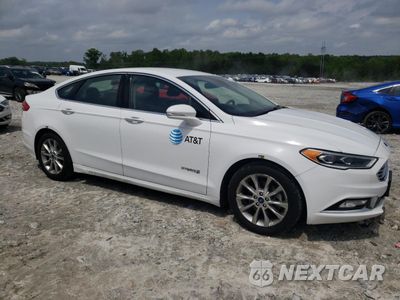 Czwarte zdjęcie samochodu z boku: 2017 FORD FUSION SE HYBRID VIN:3FA6P0LUXHR359569 - miniatura