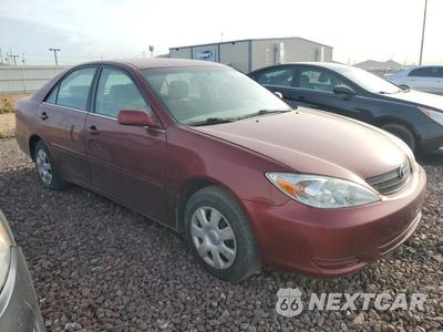 Czwarte zdjęcie samochodu z boku: 2002 TOYOTA CAMRY LE VIN:4T1BE32K72U063467 - miniatura