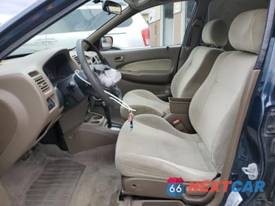 Zdjęcie 7 z 14 samochodu: 1998 MAZDA PROTEGE DX VIN:JM1BC1411W0238344 - miniatura