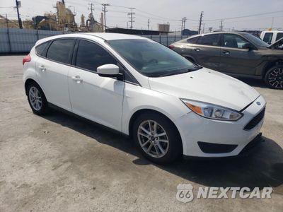 Czwarte zdjęcie samochodu z boku: 2018 FORD FOCUS SE VIN:1FADP3K29JL287647 - miniatura