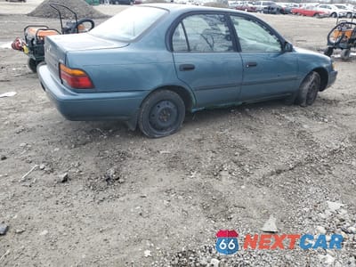 Trzecie zdjęcie samochodu z tyłu: 1994 TOYOTA COROLLA LE VIN:1NXAE09B0SZ297630 - miniatura