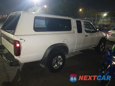 Trzecie zdjęcie samochodu z tyłu: 1998 NISSAN FRONTIER KING CAB XE VIN:1N6DD26Y3WC351312 - miniatura