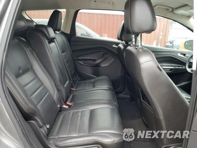 Zdjęcie 11 z 13 samochodu: 2014 FORD ESCAPE TITANIUM VIN:1FMCU0J99EUE38669 - miniatura