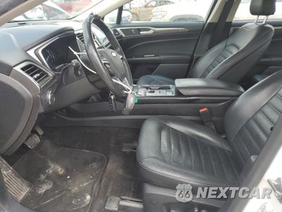 Zdjęcie 7 z 13 samochodu: 2018 FORD FUSION SE HYBRID VIN:3FA6P0LU7JR118803 - miniatura