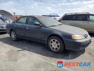 Czwarte zdjęcie samochodu z boku: 1999 ACURA 3.2TL VIN:19UUA5642XA001811 - miniatura