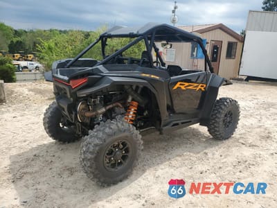 Czwarte zdjęcie samochodu z boku: 2024 POLARIS RZR XP 1000 ULTIMATE VIN:3NSNEF999RF298816 - miniatura