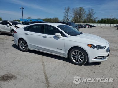 Czwarte zdjęcie samochodu z boku: 2017 FORD FUSION SE HYBRID VIN:3FA6P0LU4HR400701 - miniatura