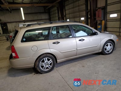 Trzecie zdjęcie samochodu z tyłu: 2000 FORD FOCUS SE VIN:1FAHP36P7YW219878 - miniatura