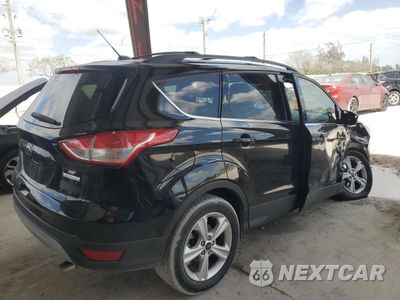 Trzecie zdjęcie samochodu z tyłu: 2016 FORD ESCAPE SE VIN:1FMCU0GX3GUB43902 - miniatura
