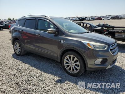 Czwarte zdjęcie samochodu z boku: 2017 FORD ESCAPE TITANIUM VIN:1FMCU0JD8HUD51726 - miniatura