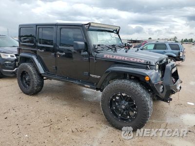 Czwarte zdjęcie samochodu z boku: 2015 JEEP WRANGLER UNLIMITED RUBICON VIN:1C4HJWFG1FL710264 - miniatura