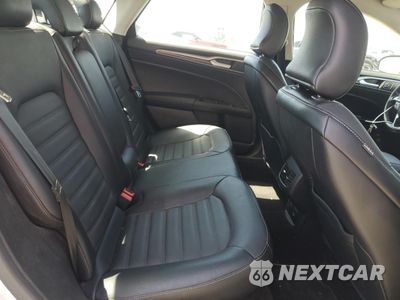 Zdjęcie 10 z 12 samochodu: 2017 FORD FUSION SE HYBRID VIN:3FA6P0LU7HR408890 - miniatura