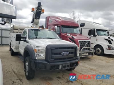 Czwarte zdjęcie samochodu z boku: 2015 FORD F450 SUPER DUTY VIN:1FDUF4GY7FEA16934 - miniatura