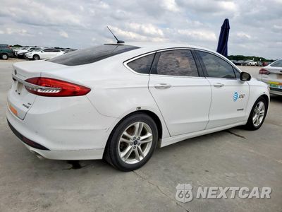 Trzecie zdjęcie samochodu z tyłu: 2018 FORD FUSION SE HYBRID VIN:3FA6P0LU5JR129847 - miniatura