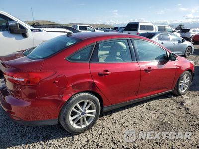 Trzecie zdjęcie samochodu z tyłu: 2016 FORD FOCUS SE VIN:1FADP3F24GL234180 - miniatura