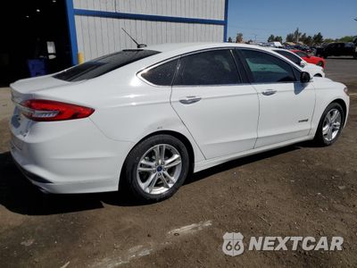 Trzecie zdjęcie samochodu z tyłu: 2018 FORD FUSION SE HYBRID VIN:3FA6P0LU7JR171601 - miniatura