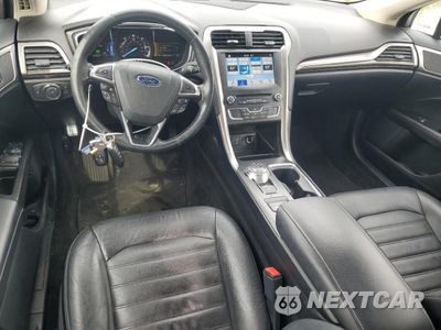 Zdjęcie 8 z 12 samochodu: 2017 FORD FUSION SE HYBRID VIN:3FA6P0LU8HR408901 - miniatura