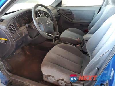 Zdjęcie 7 z 12 samochodu: 2004 HYUNDAI ELANTRA GLS VIN:KMHDN46DX4U832685 - miniatura