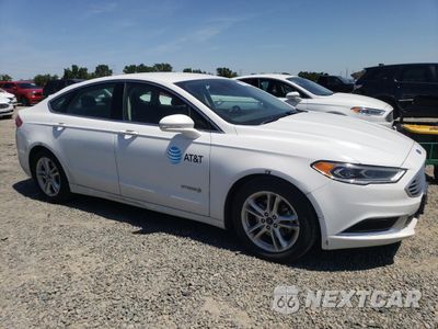 Czwarte zdjęcie samochodu z boku: 2018 FORD FUSION SE HYBRID VIN:3FA6P0LU0JR129836 - miniatura