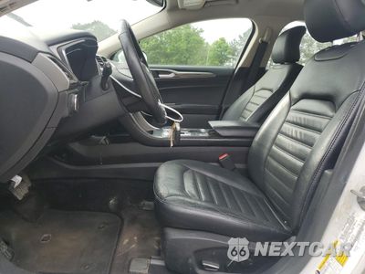Zdjęcie 7 z 12 samochodu: 2018 FORD FUSION SE HYBRID VIN:3FA6P0LU2JR118806 - miniatura