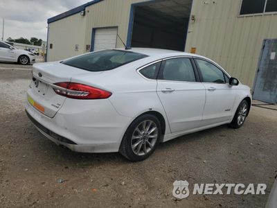 Trzecie zdjęcie samochodu z tyłu: 2017 FORD FUSION SE HYBRID VIN:3FA6P0LU9HR408955 - miniatura