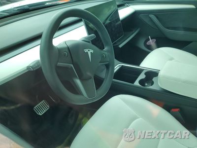 Zdjęcie 9 z 13 samochodu: 2023 TESLA MODEL Y VIN:7SAYGDEE8PF620703 - miniatura