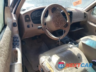 Zdjęcie 8 z 13 samochodu: 2001 FORD EXPLORER EDDIE BAUER VIN:1FMZU64EX1ZA68755 - miniatura