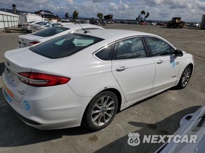 Trzecie zdjęcie samochodu z tyłu: 2017 FORD FUSION SE HYBRID VIN:3FA6P0LU6HR408962 - miniatura