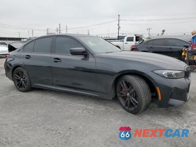 Czwarte zdjęcie samochodu z boku: 2023 BMW 330I VIN:3MW69FF05P8D54961 - miniatura