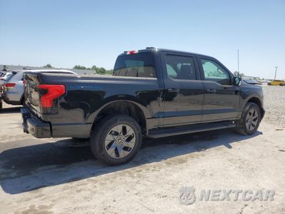 Trzecie zdjęcie samochodu z tyłu: 2024 FORD F150 LIGHTNING XLT VIN:1FT6W3L70RWG08288 - miniatura