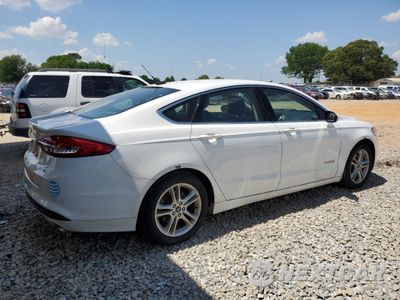 Trzecie zdjęcie samochodu z tyłu: 2018 FORD FUSION SE HYBRID VIN:3FA6P0LU0JR129934 - miniatura