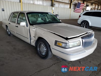 Czwarte zdjęcie samochodu z boku: 1996 LINCOLN TOWN CAR CARTIER VIN:1LNLM83W7TY640188 - miniatura