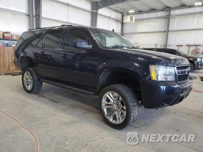 Czwarte zdjęcie samochodu z boku: 2007 CHEVROLET SUBURBAN K1500 VIN:1GNFK16337J264479 - miniatura