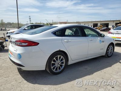 Trzecie zdjęcie samochodu z tyłu: 2017 FORD FUSION SE HYBRID VIN:3FA6P0LU9HR400709 - miniatura