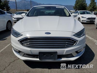 Piąte zdjęcie samochodu w środku: 2017 FORD FUSION SE HYBRID VIN:3FA6P0LUXHR409337 - miniatura