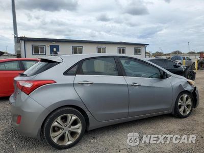 Trzecie zdjęcie samochodu z tyłu: 2013 HYUNDAI ELANTRA GT VIN:KMHD35LEXDU082892 - miniatura