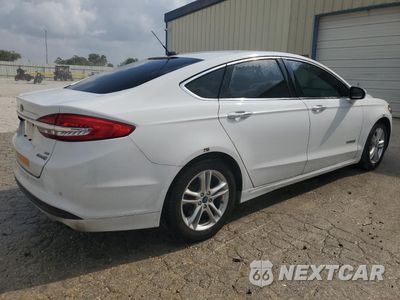 Trzecie zdjęcie samochodu z tyłu: 2018 FORD FUSION SE HYBRID VIN:3FA6P0LU4JR129807 - miniatura