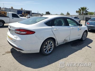 Trzecie zdjęcie samochodu z tyłu: 2017 FORD FUSION SE HYBRID VIN:3FA6P0LU8HR408915 - miniatura