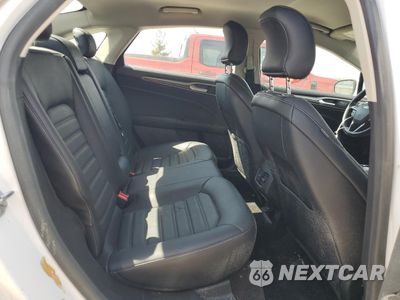 Zdjęcie 10 z 13 samochodu: 2018 FORD FUSION SE HYBRID VIN:3FA6P0LUXJR171978 - miniatura