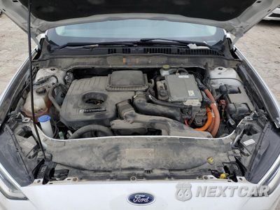 Zdjęcie 11 z 12 samochodu: 2018 FORD FUSION SE HYBRID VIN:3FA6P0LU5JR172035 - miniatura