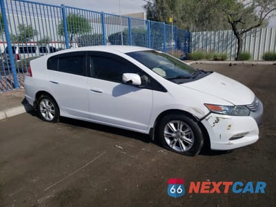 Czwarte zdjęcie samochodu z boku: 2010 HONDA INSIGHT EX VIN:JHMZE2H75AS007066 - miniatura