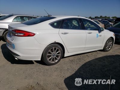 Trzecie zdjęcie samochodu z tyłu: 2017 FORD FUSION SE HYBRID VIN:3FA6P0LU4HR409365 - miniatura
