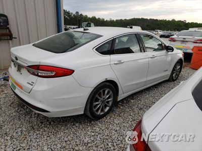 Trzecie zdjęcie samochodu z tyłu: 2017 FORD FUSION SE HYBRID VIN:3FA6P0LU9HR409491 - miniatura