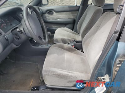 Zdjęcie 7 z 12 samochodu: 1994 TOYOTA COROLLA LE VIN:1NXAE09B0SZ297630 - miniatura