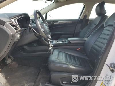 Zdjęcie 7 z 13 samochodu: 2018 FORD FUSION SE HYBRID VIN:3FA6P0LU6JR118873 - miniatura