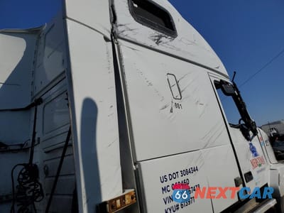 Zdjęcie 9 z 10 samochodu: 2013 VOLVO VN VNL VIN:4V4NC9TH2DN567438 - miniatura